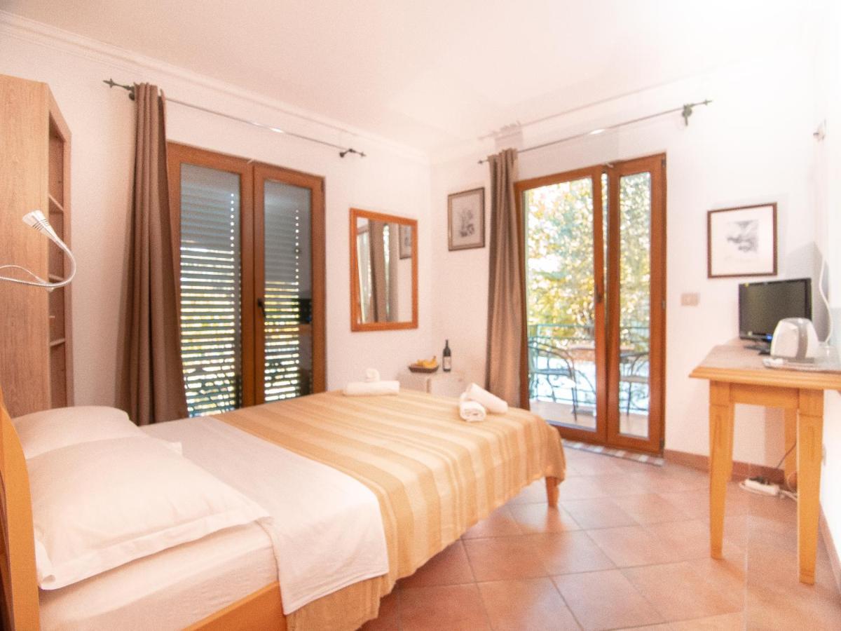 Apartments And Rooms Levantin Inn Sveti Stefan Bagian luar foto